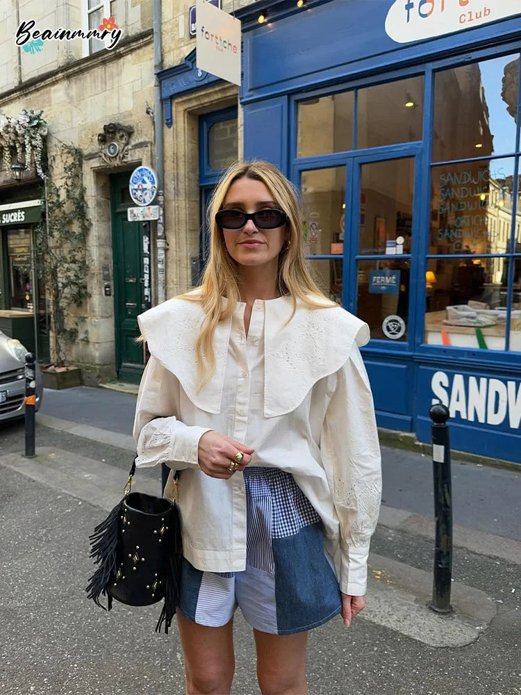 Camisas de moda para mujer con bordado blanco y solapa grande